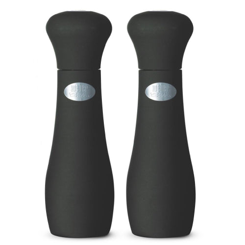 Two black salt and pepper shakers with silver Weber labels 